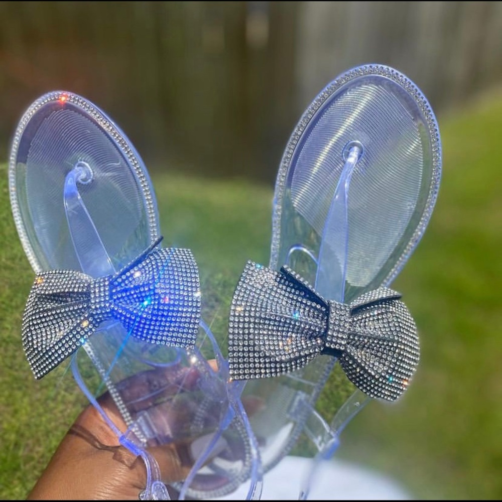 Clear jelly sandals with bow